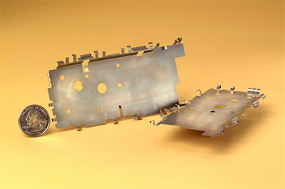 Progressive Die Stamping of a Nickel Conductive Shield for the Cell Phone Industry