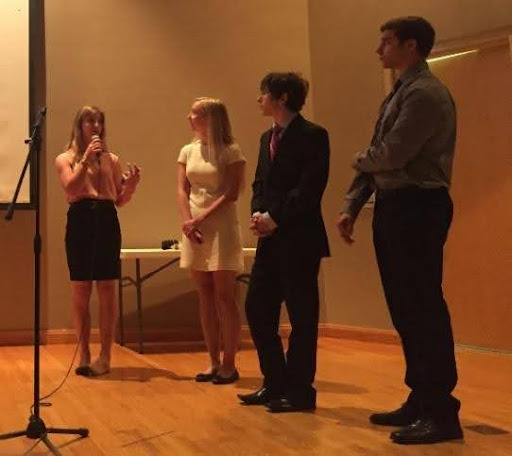 Student speakers at community outreach event